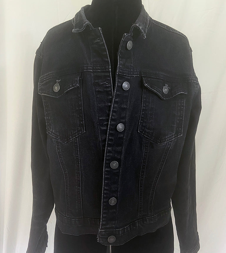 Black denim jacket on a mannequin against a white background