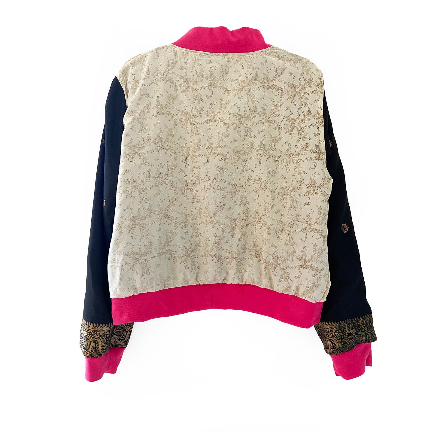 Back view of a sari bomber jacket with floral pattern and pink trim on a white background