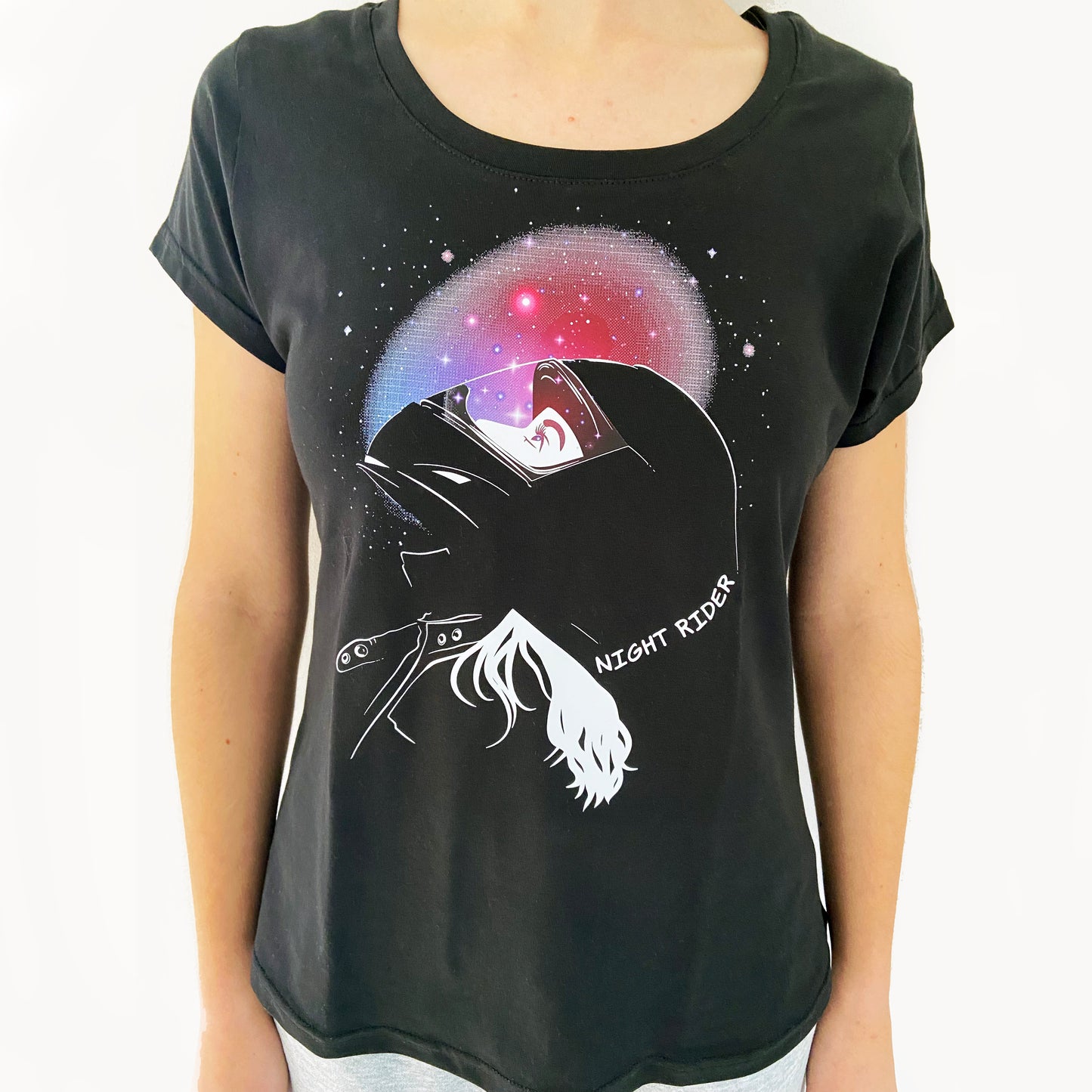 Black t-shirt with a graphic design of a helmet and 'Night Rider' text on a white background