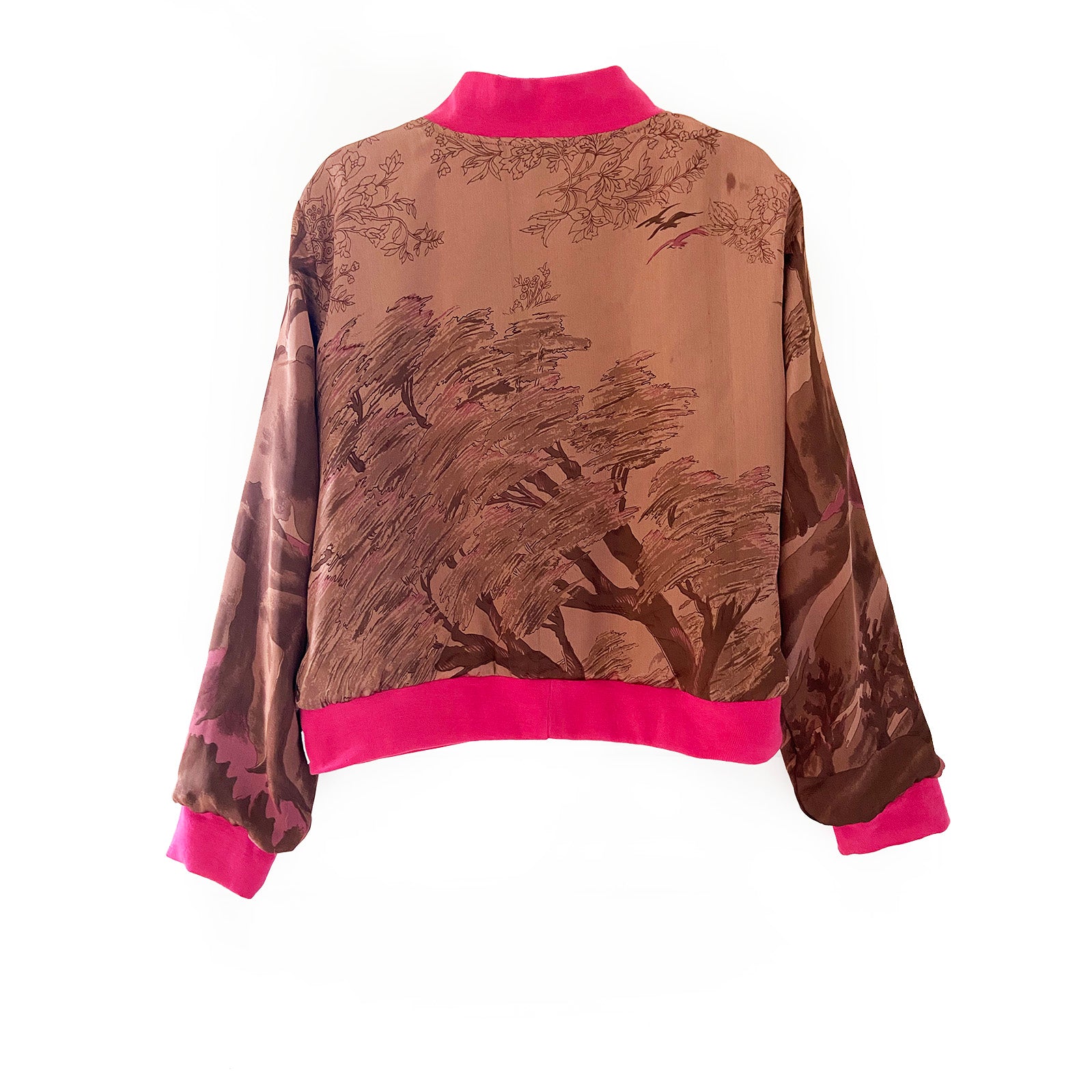 Silk patterned sari bomber jacket with pink ribbing on a white background
