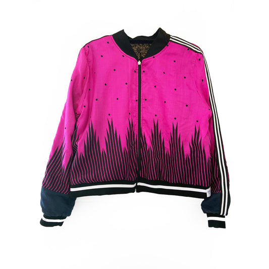 Pink bomber jacket with black patterns and stripes on a white background