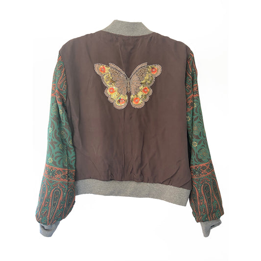 Grey and green jacket with butterfly design on the back on a white background
