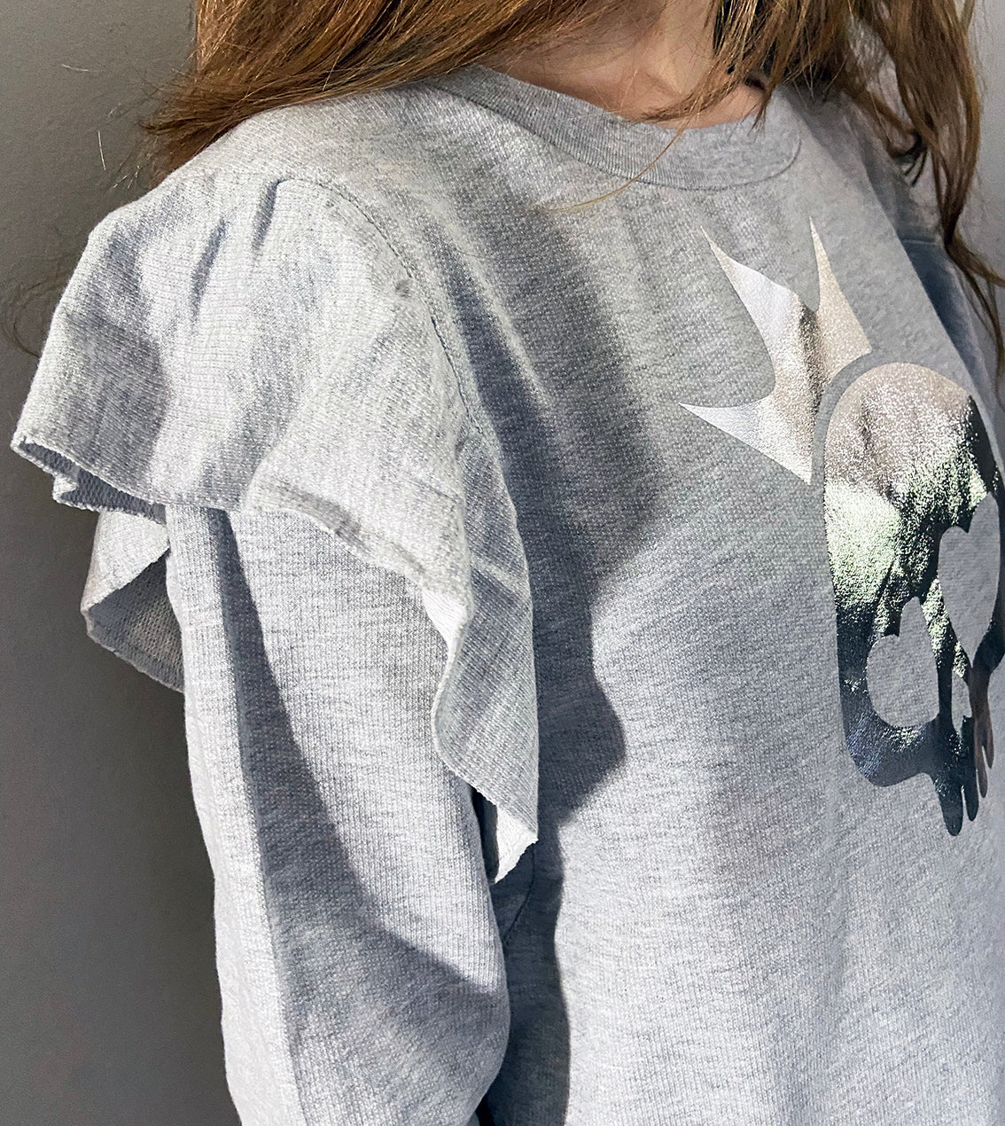 Close up of sleeve frill detail