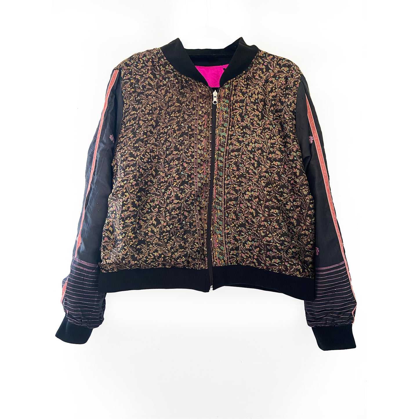 Sari floral bomber jacket with black and pink accents on a white background