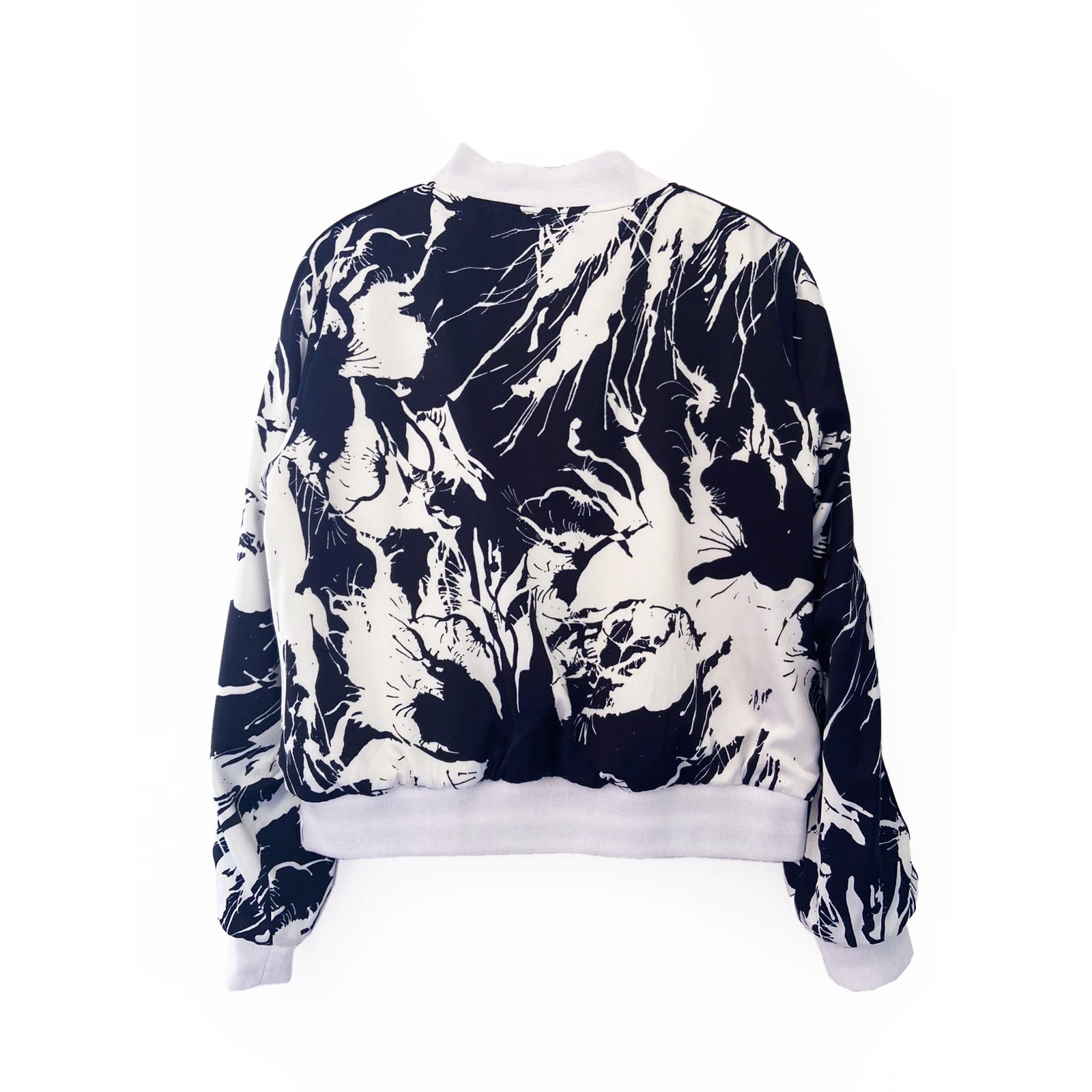 bomber jacket with black and white abstract pattern on a white background