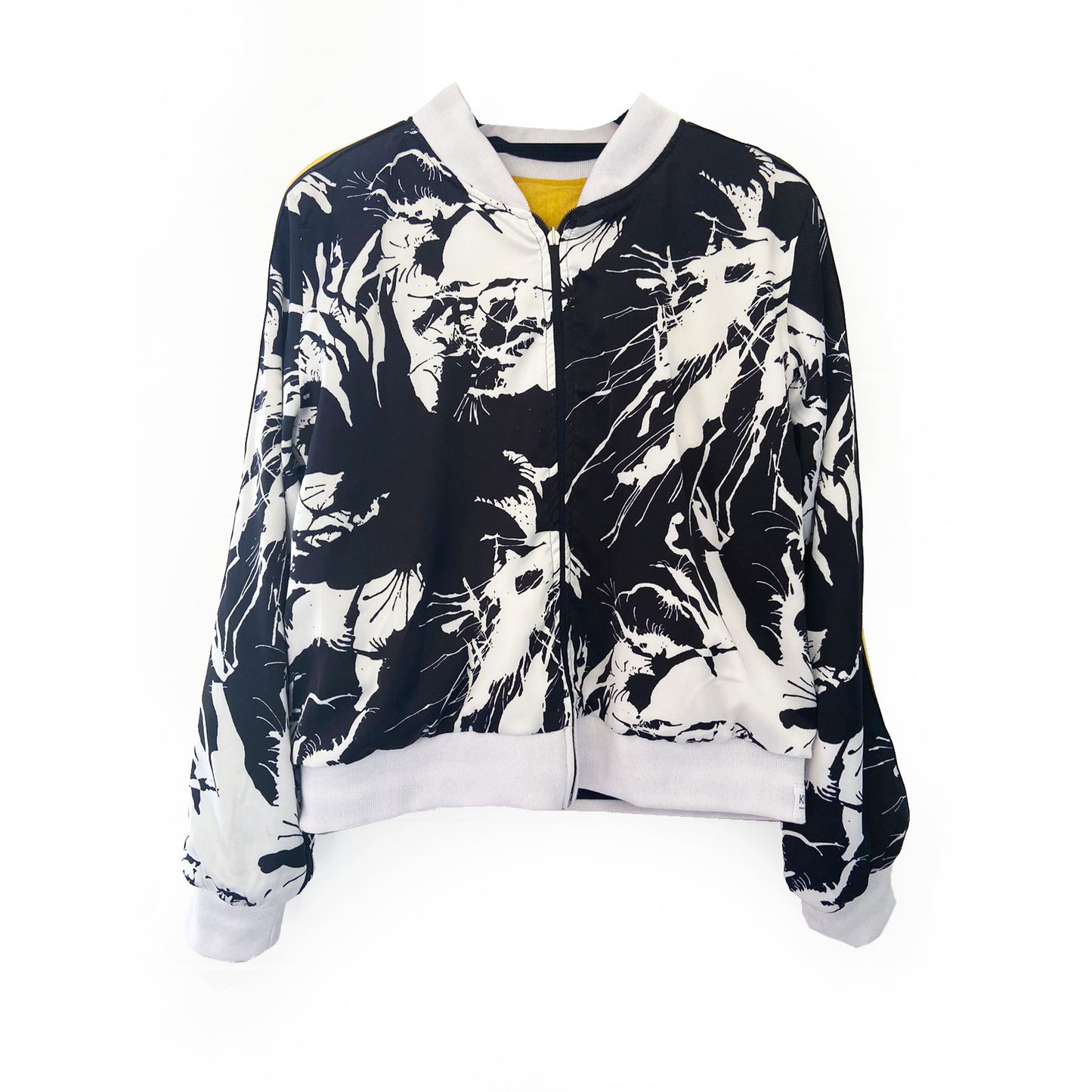 Black and white patterned bomber jacket on a white background