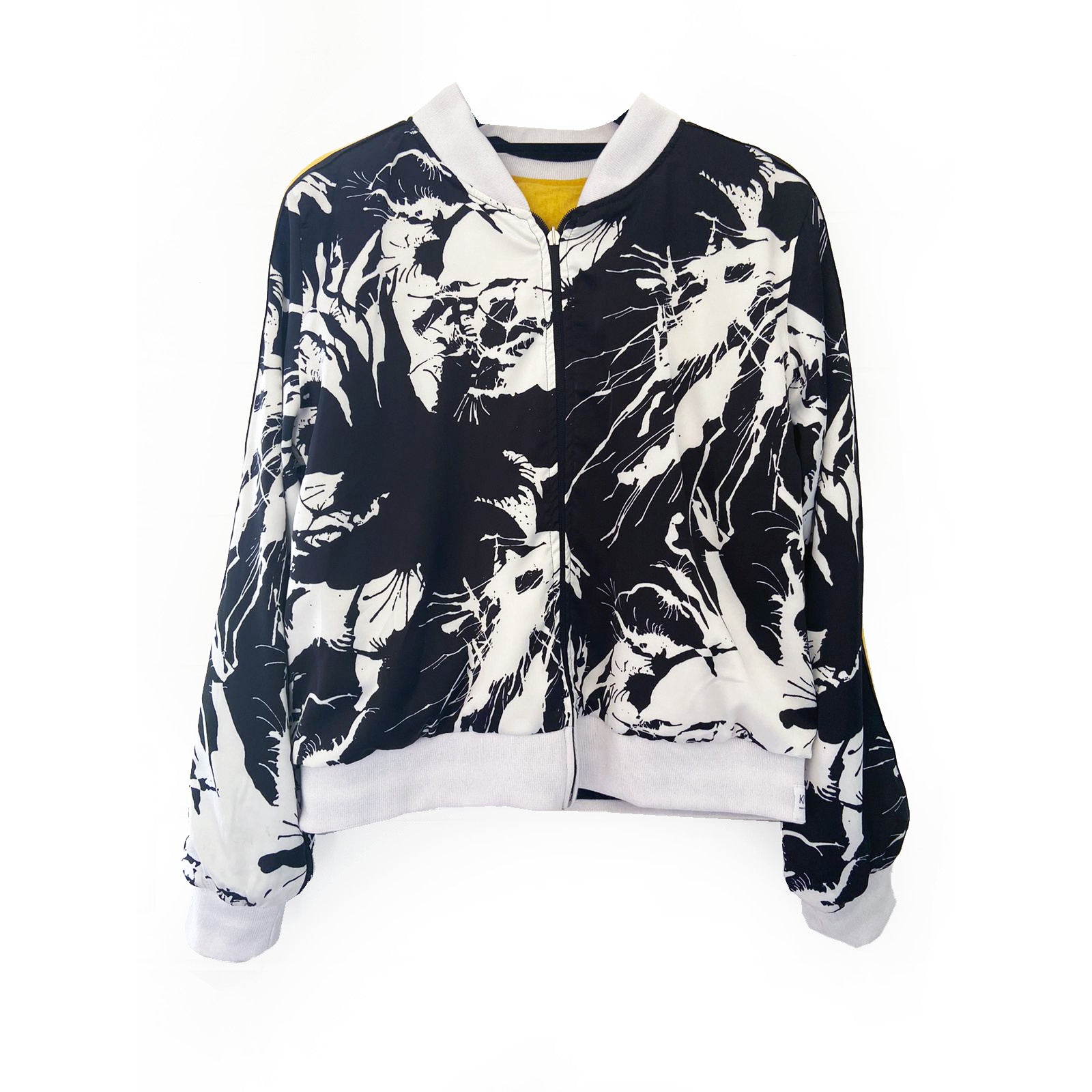 Black and white patterned bomber jacket on a white background