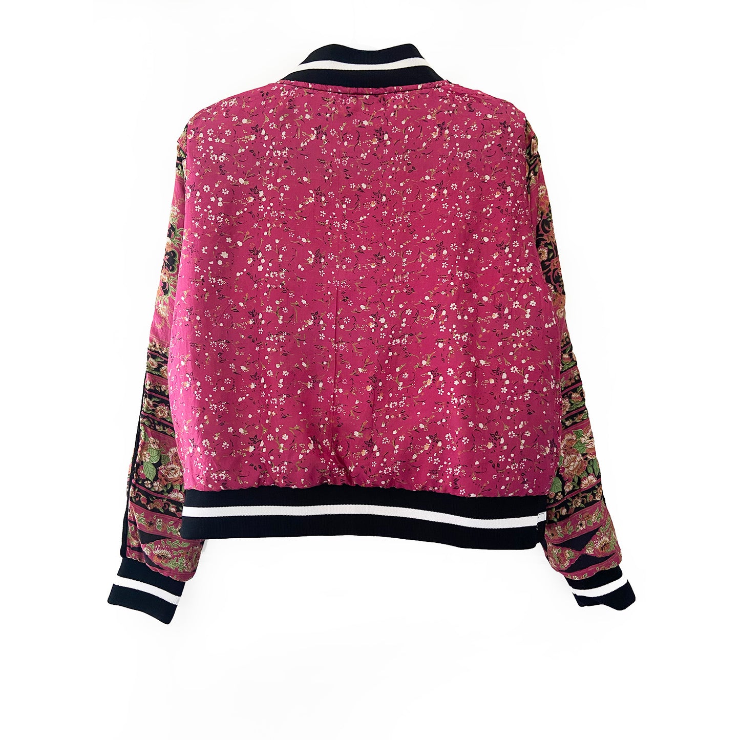 Pink sari bomber jacket with patterned sleeves on a white background