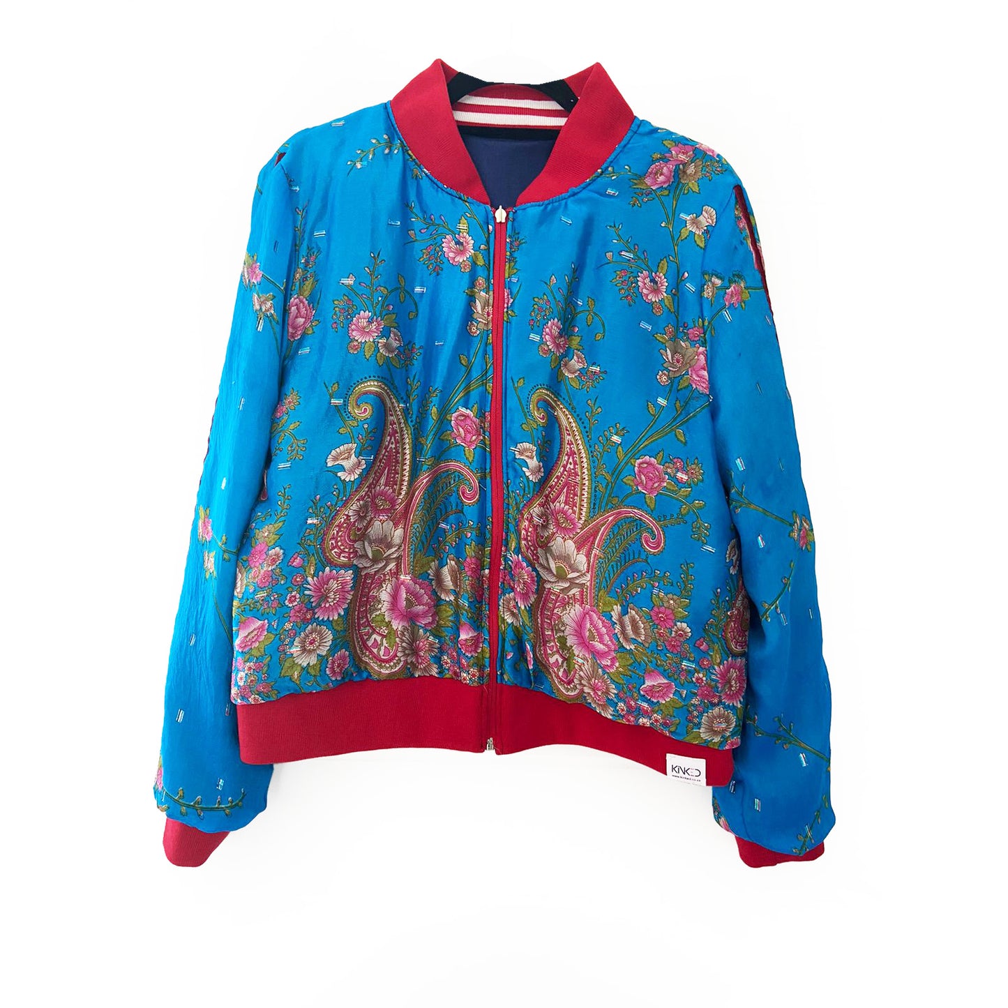 Blue floral and paisley patterned jacket with red accents on a white background