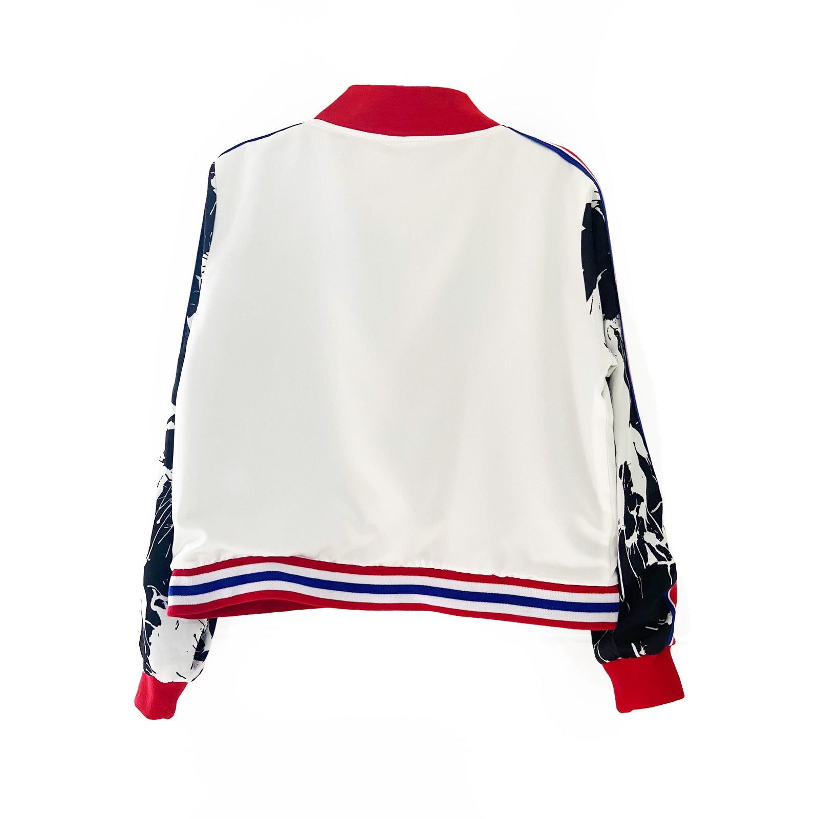 Back view of a white jacket with black pattern sleeves and red, blue, and white accents on a white background
