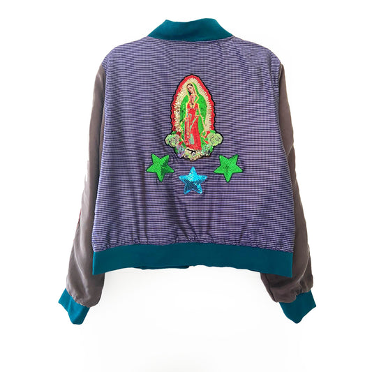 Jacket with embroidered design on the back against a white background