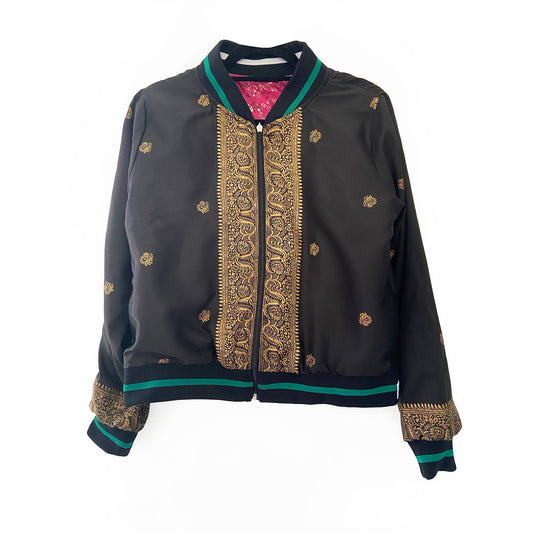 Black jacket with gold pattern sari on a white background