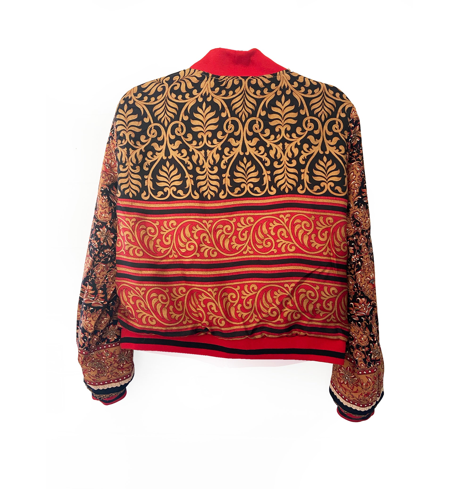 Patterned jacket with beige, red, and black design on a white background