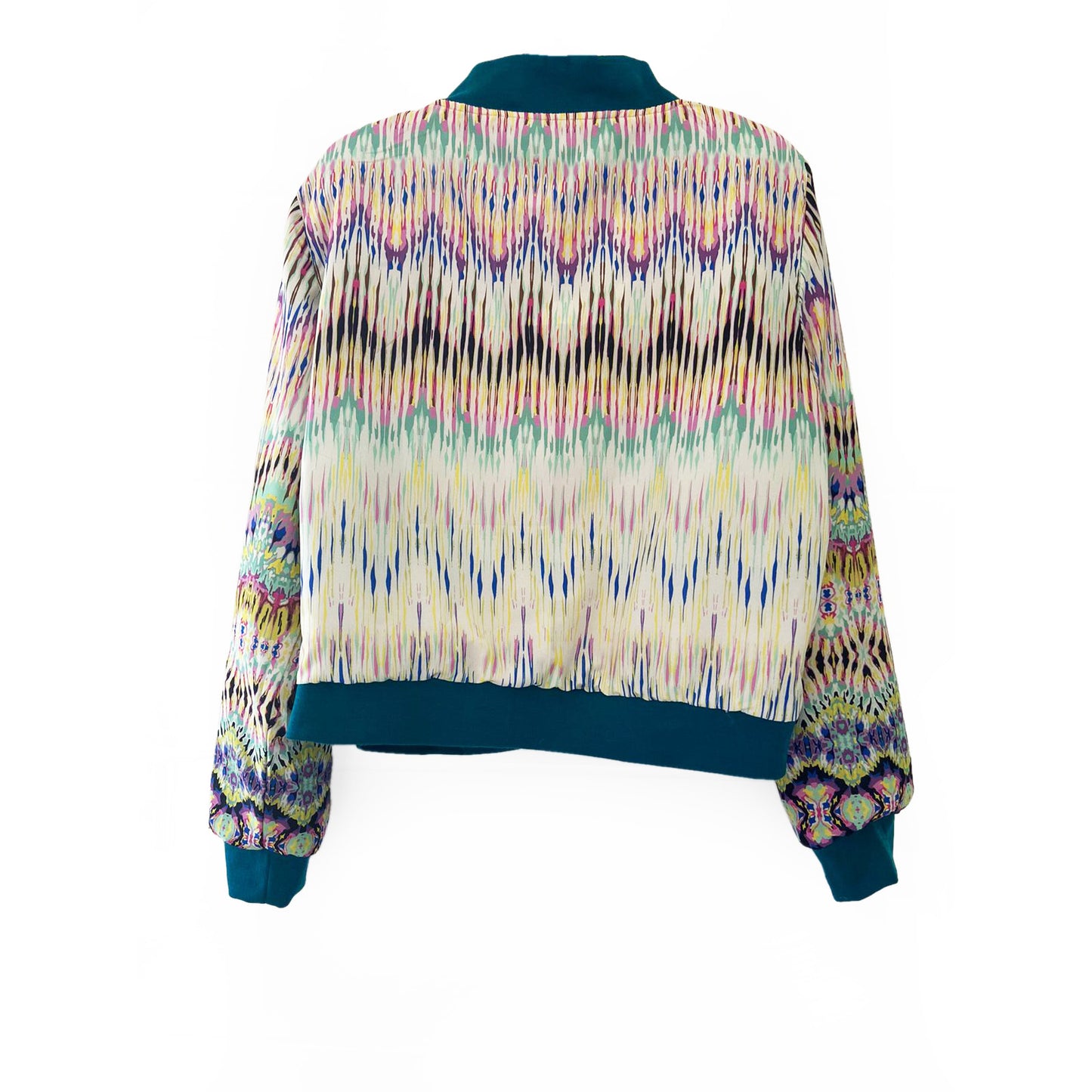 Multicolored patterned sweater on a white background