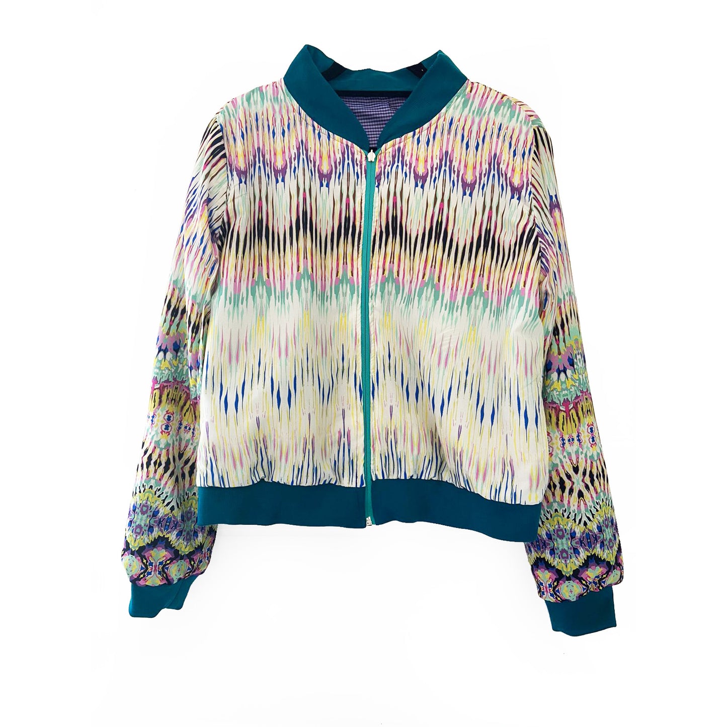 Multicolored patterned jacket with blue trim on a white background